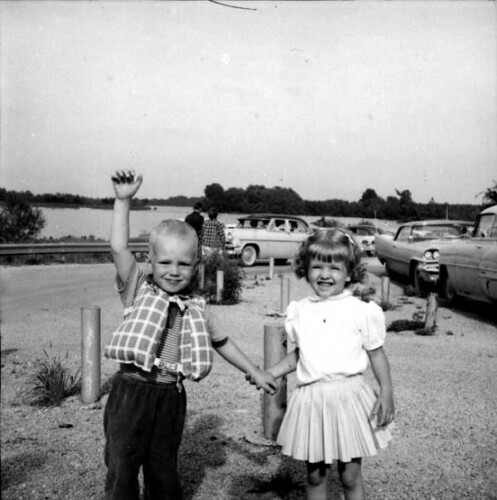 Children Holding Hands Logo. Two children holding hands