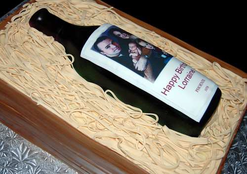 Wine bottle in a wooden crate birthday cake
