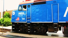 Metra late 1970's era EMD F-40PH locomotive "Will County" departing Northbrook Illinois. Wednsday, May 26th  2010.