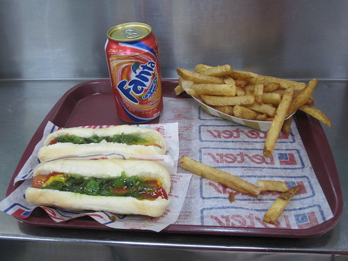 2 hot-dogs, frieds, Fanta - $7 including tip