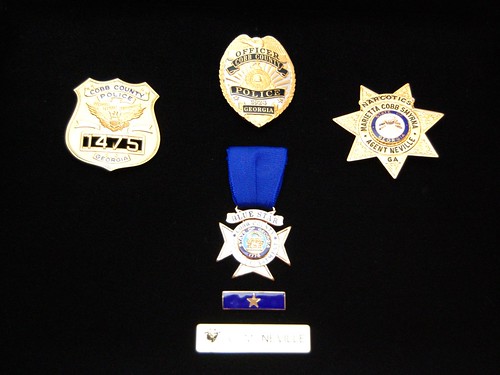 Chris's badges from Cobb Co. PD