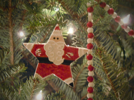 ceramic star santa ornament