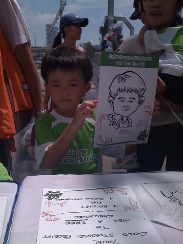 caricature live sketching for Cold Storage Kids Run 2010 - 25