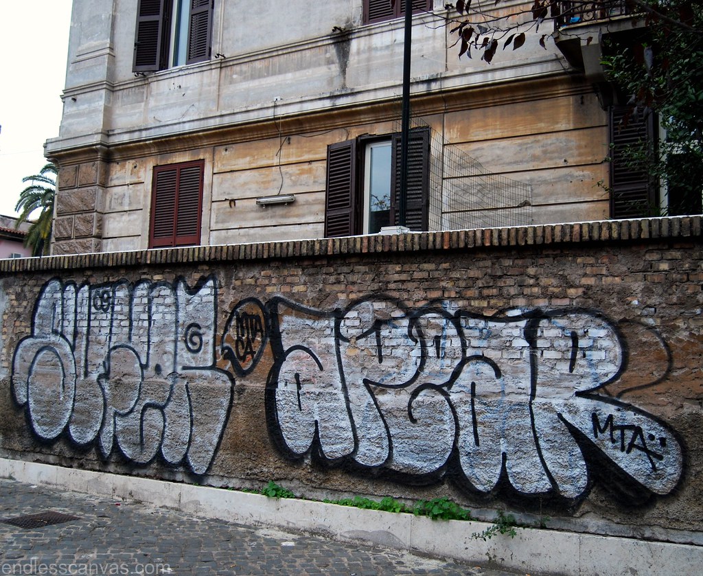 sufer apear mta rome italy graffiti. 