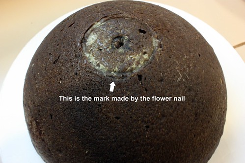 cake with flower nail mark