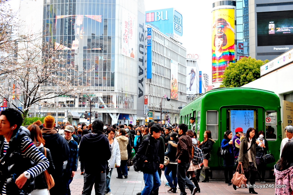 The weather is picking up and plenty of people are out in Shibuya waiting to meet friends.
