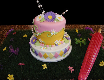 Pink Purple and Yellow Daisy Birthday Cake customer display