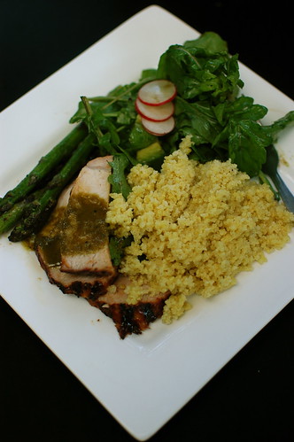 barbequed pork with green-juice sauce, millet, asparagus, and a lovely salad