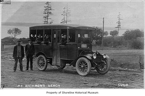 Bus in front of Umbrite's Drug Store, Richmond Beach, ca. 1915
