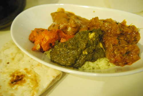 Chicken Tikka Masala, Palak Paneer, Roasted eggplant curry, Beef Korma with rice and naan from India Palace
