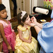 Fairy Godmother does face painting on Emma!
