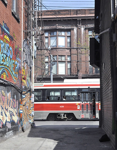 Queen St West streetcar seen from an alley by Uncle Lynx.