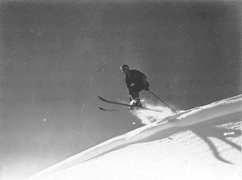 Skier making cornice jump