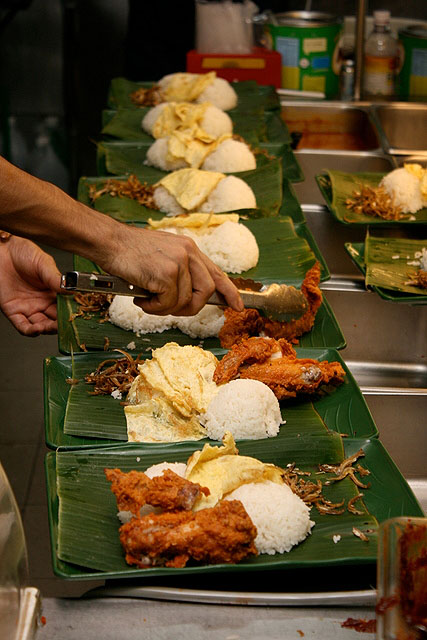 Very generous mounds of fragrant coconut rice, systematically topped with sides of choice