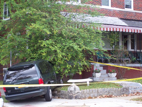 Car crash onto a sidewalk and front yard, 8th Street and Tewksbury Place NW, Washington, DC