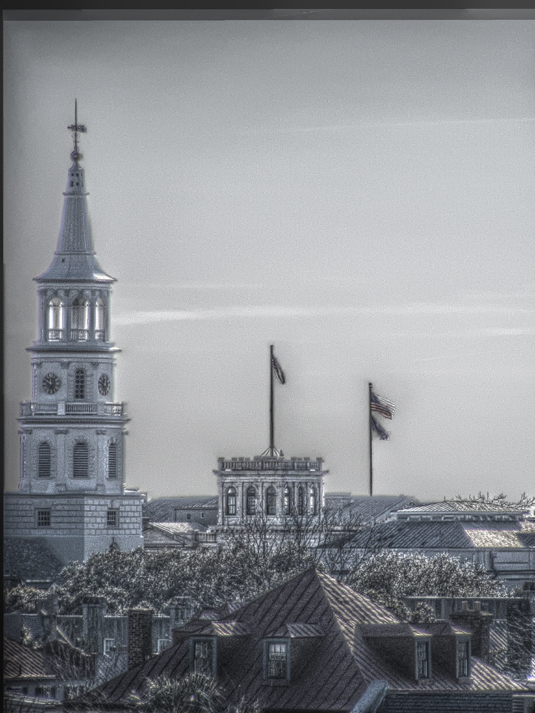 Church tower and three flags