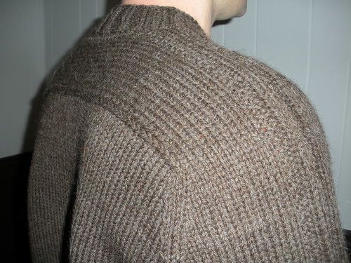 Troy's sweater shoulder