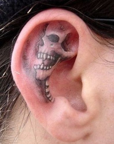 Skull Tattoo In Ear. Skull tattoo in ear