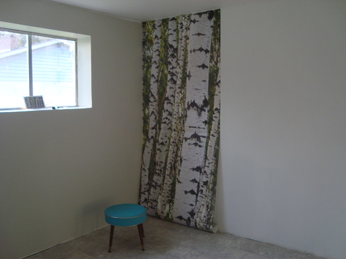 me trying to figure out the placement of our birch wallpaper!