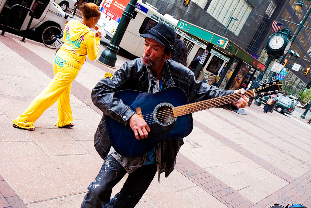 Man-playing-guitar--Center-City