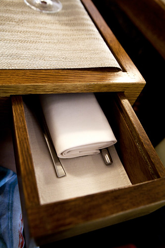 Secret table drawer for flatware and napkins