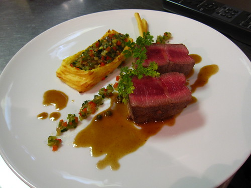 Ostrich with potato duchess and brunoise vegetables