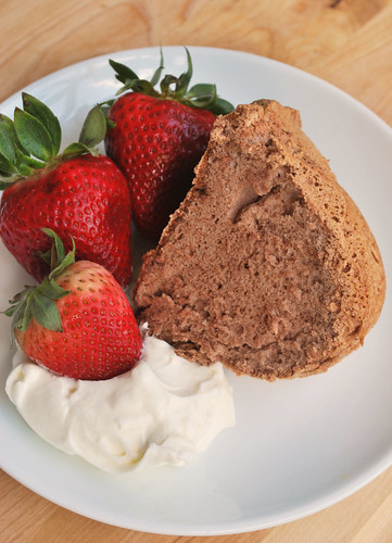 Chocolate Angel Food Cake - light and fluffy chocolate cake. Perfect with summer strawberries and fresh whipped cream!
