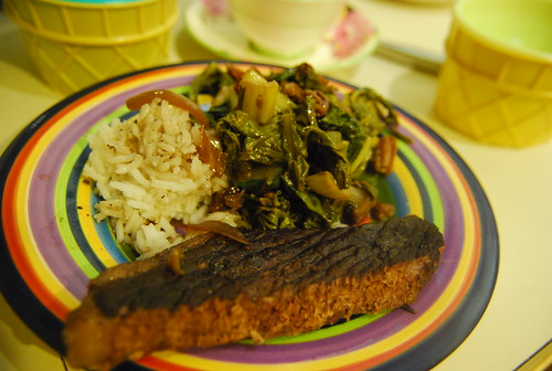 Braised cross rib steak with rice and green chard with pecans and raisins