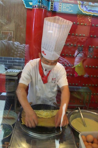 Chef making Egg Crepe