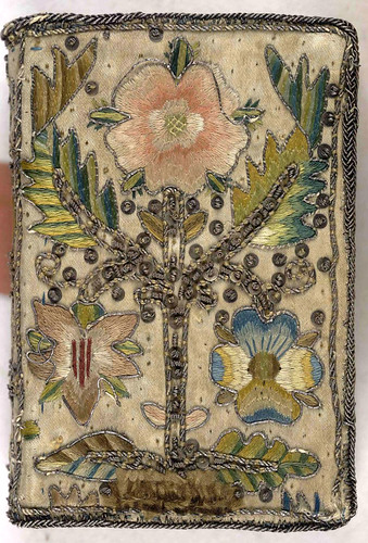 17th century embroidered satin book with floral motif.