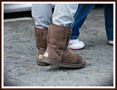 Classic short UGG boots worn by young girl - O...