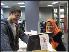 picture of two students at a compuer