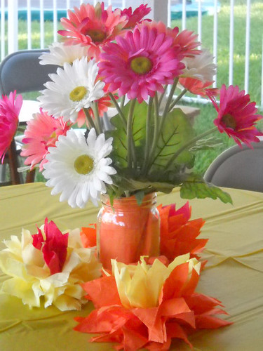 For the centerpieces we used some Mason Jars and Gerbera Daisies that my mom