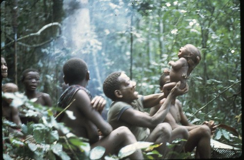 holding up baby at kugongea