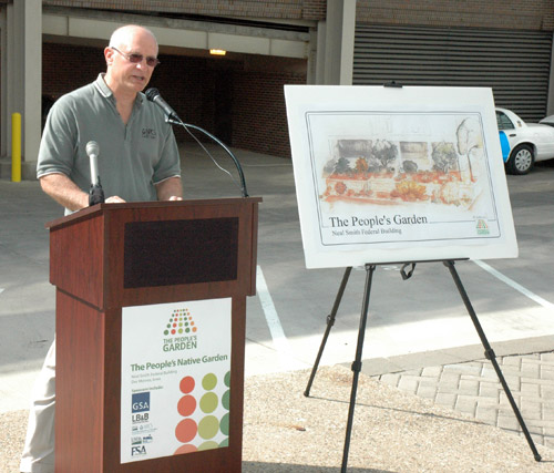 Rich Sims speaks at the Des Moines People's Garden groundbreaking ceremony