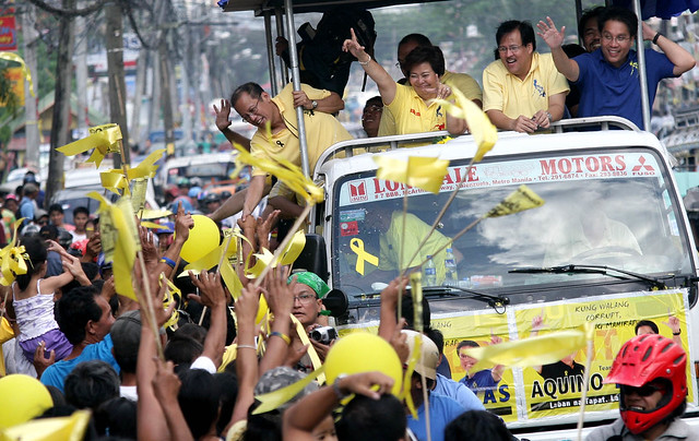 President Aquino campaigns on a Jeepney in Manila last year.