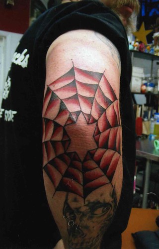 spider web elbow tattoo