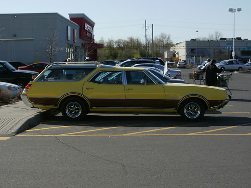 A 1969 Oldsmobile Vista Cruiser 442 station wagon in profile by Steve 