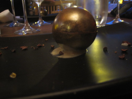 Golden dark chocolate sphere filled with a foie gras concoction