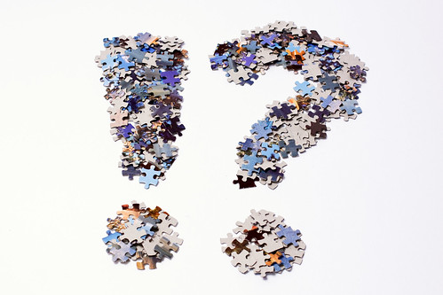 Punctuation marks made of puzzle pieces