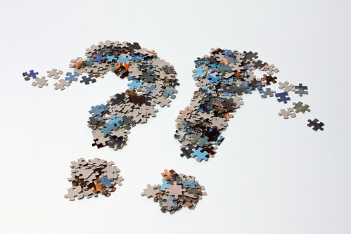 A question and exclamation mark of jigsaw puzzle pieces