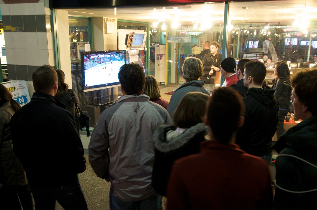 People Gathered Around to Watch Team Canada vs Norway