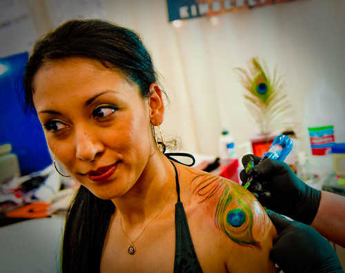 Tattoo Expo getting a peacock feather design