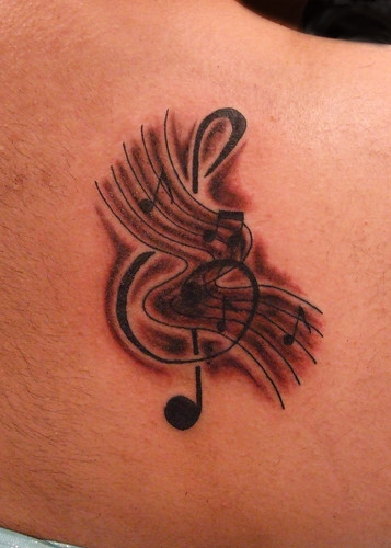  Black and Grey Triple Clef and Music Notes Tattoo · Blue Eye of Ra 