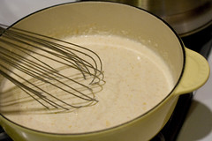 Pour in the cream and keep whisking