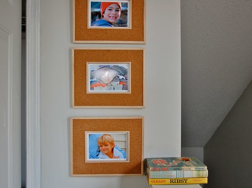 framed photos in the playroom