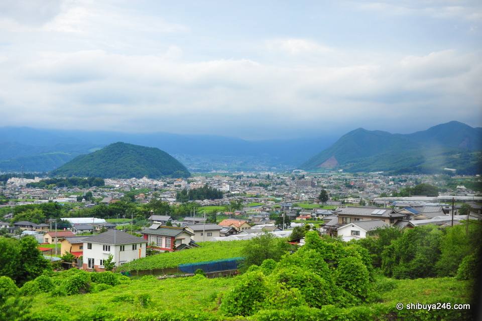 Getting closer to Kofu there are lots of mountains. Kofu is surrounded by mountain ranges and is like a bonchi, very similar to Kyoto, meaning in winter it is quite cold but in summer can be very humid.