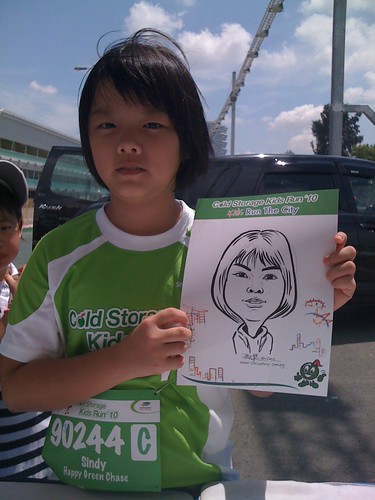 caricature live sketching for Cold Storage Kids Run 2010 - 27