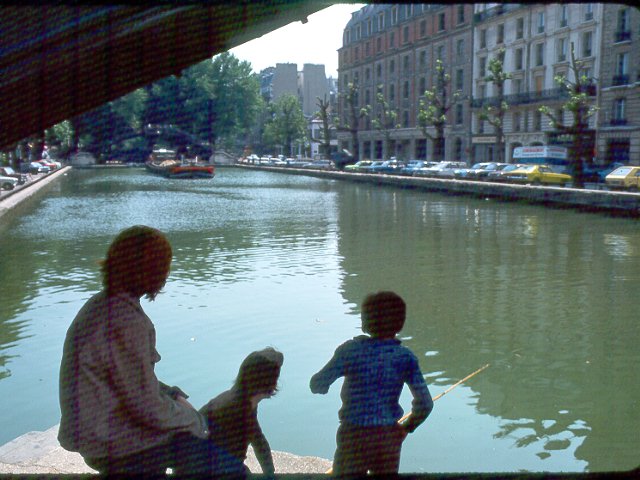 Parisians fishing in canal