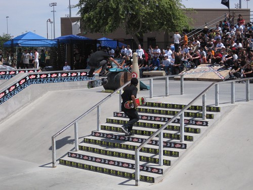 Oscar Meza from Mainline Skateshop. backside flip over the rail